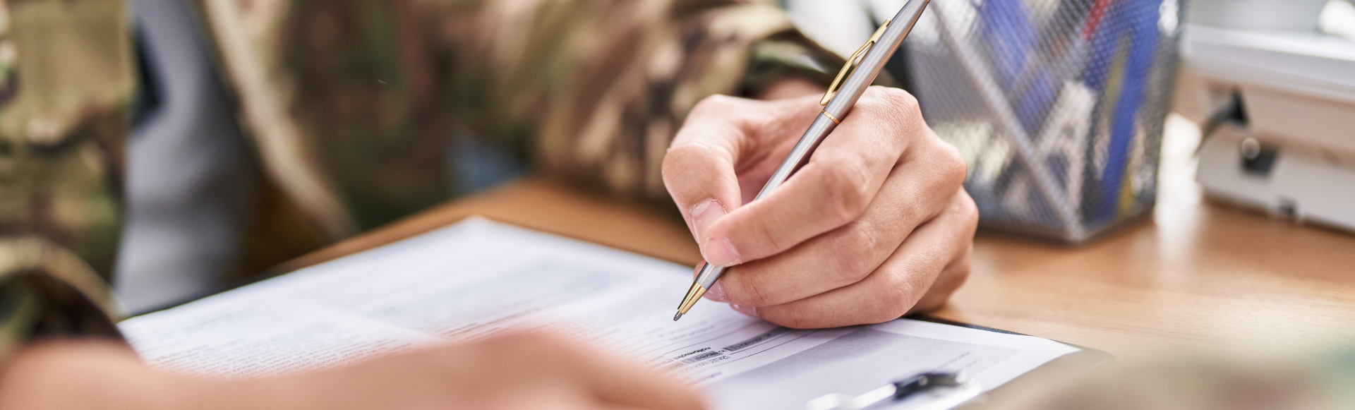 Young hispanic man army soldier signing contract at office