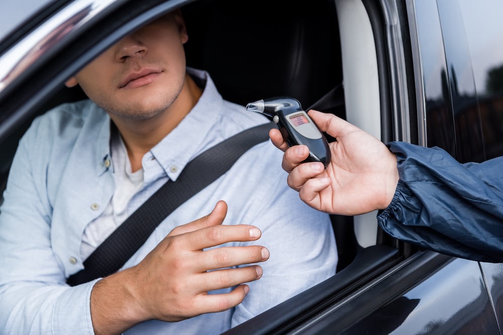 driver receiving breathalyzer