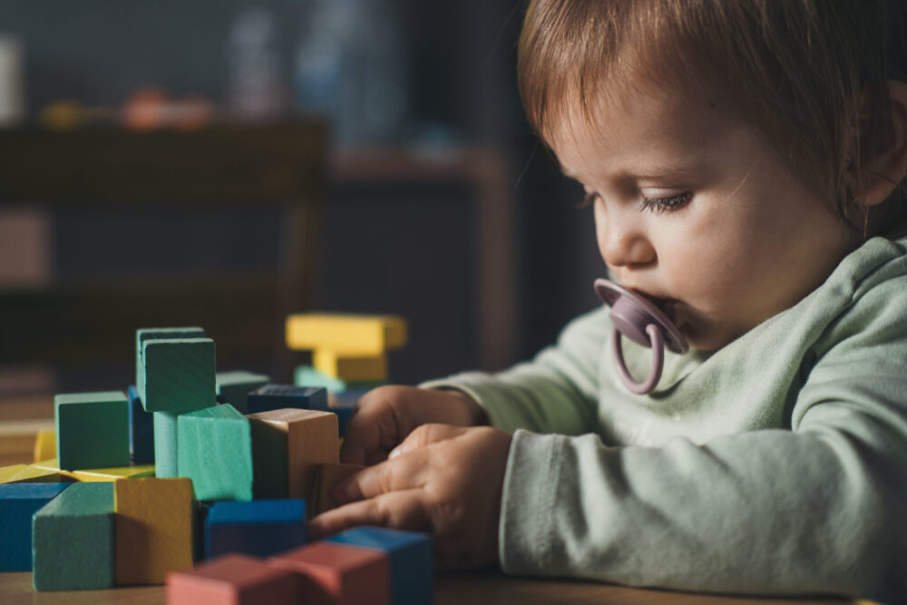 child playing blocks